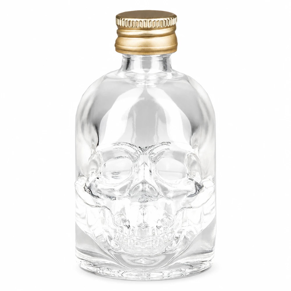 Bouteille en verre Hector de 50 ml avec design de tête de mort et bouchon à vis doré UNiTWIST pour spiritueux et boissons