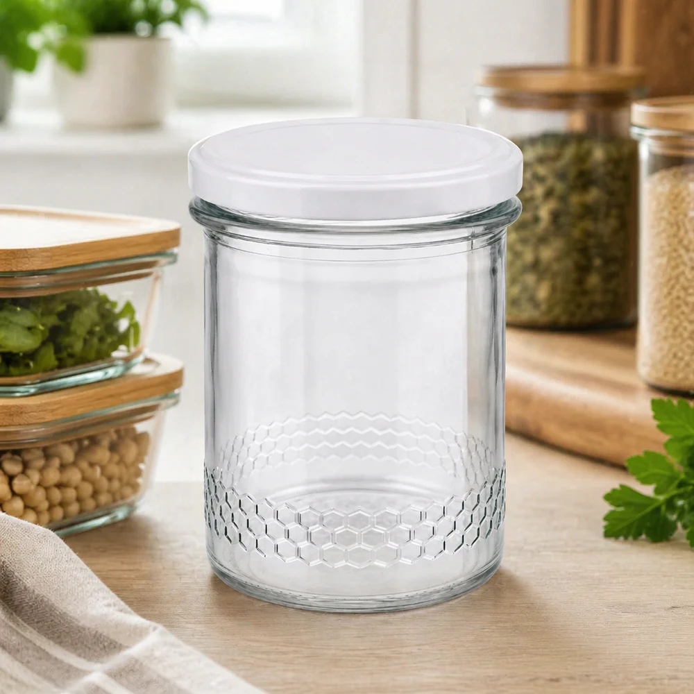Pot à miel 560 g avec couvercle blanc BasicSeal UNiTWIST 400ml pot de miel vide dans ambiance cuisine avec d'autres pots de conservation conservation décorative motif nid d'abeille BasicSeal couvercle
