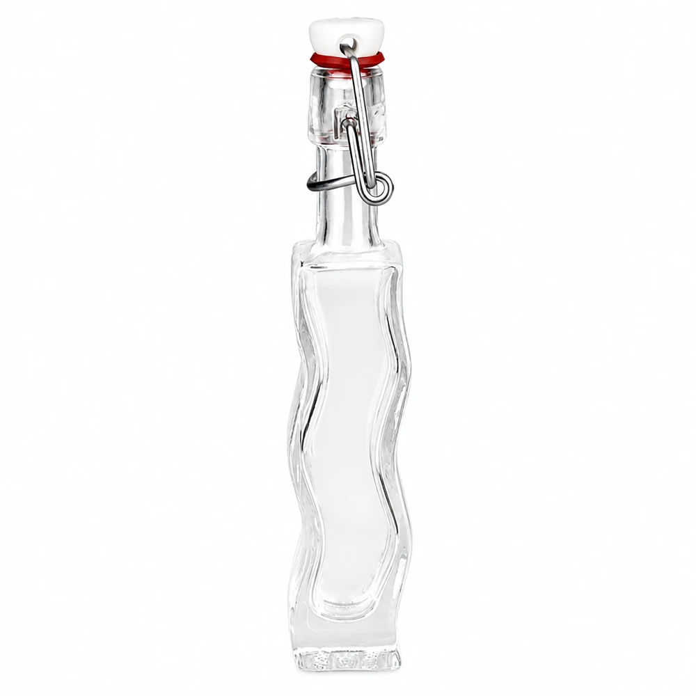 Flacon en verre « Fila » 40 ml avec bouchon en PVC UNiTWIST® Bouteille en verre Anna de 40 ml avec verre transparent et bouchon à étrier en PVC blanc UNiTWIST, forme incurvée